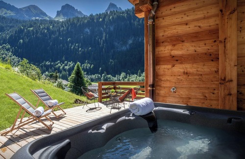 Le Grand-Bornand Ski Chalet | Chalet Angelia - modern ski home for 14, hot tub & views - OVO Network