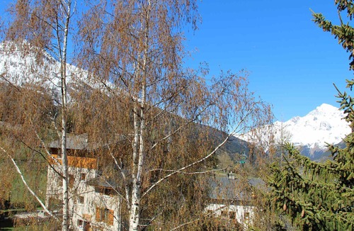 Lanslevillard Apartment | Cozy Apartment for 6 in Val Cenis Village, Close to Ski Slopes and Amenities