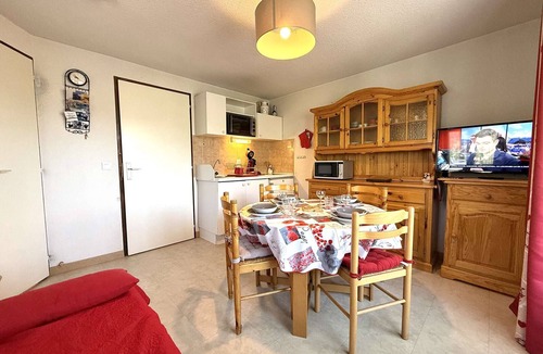 Praz-sur-Arly Apartment | Cozy Ski-In/Ski-Out Apartment in Praz Sur Arly for 4 with Balcony, Parking, and Ski Locker