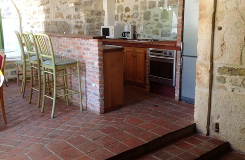Saint-Alban-sous-Sampzon House | Homerez - House for 6 ppl. with shared pool, garden and terrace at Grospierres