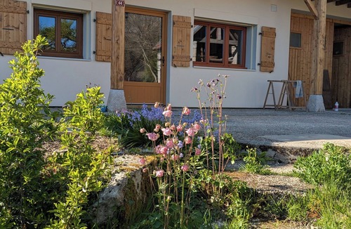 Mieussy Apartment | Large T4 garden apartment in a renovated farmhouse in a peaceful village.