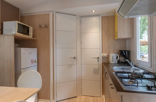 Lavilledieu RV Rental | Mobile Home 'Mobil-home B - 1-4 Persons' with Shared Pool, Private Terrace and Communal Garden