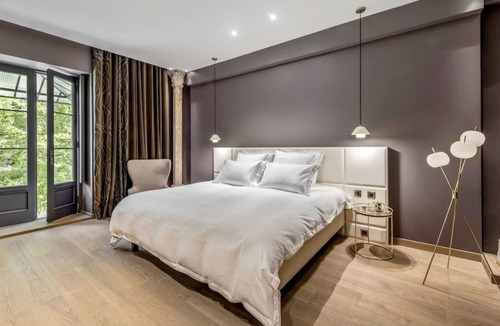 Saint-Rambert Apartment | Timeless Elegance on Île Barbe: 1BR Garden View