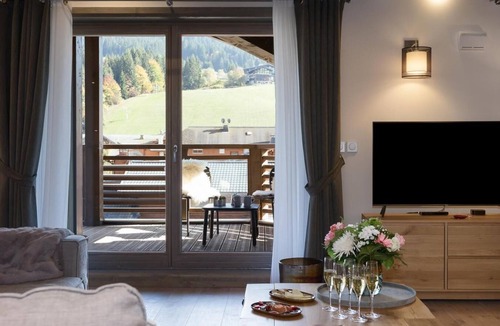 Les Gets Apartment | Wifi, resort center, 3rd floor, view mountain, sauna, hammam, terrace, balcony, fireplace or stove