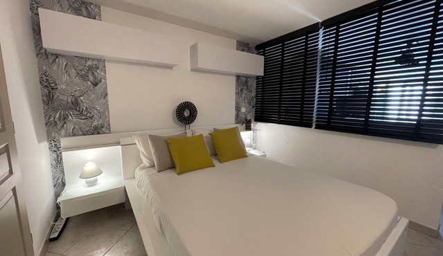Ground floor of a villa with a garden and private parking