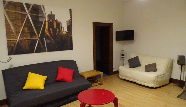 Studio, separate bedroom. Large, bright living room. Close to shops.